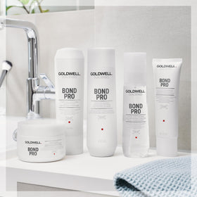 Goldwell Bond Pro next to a 1-liter scale showing product quantity and value