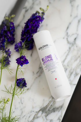 Goldwell after-wash blonde hair appearing neutralized and luminous