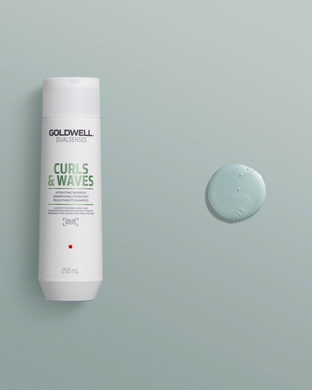 Goldwell bottle on bathroom shelf demonstrating everyday curl care