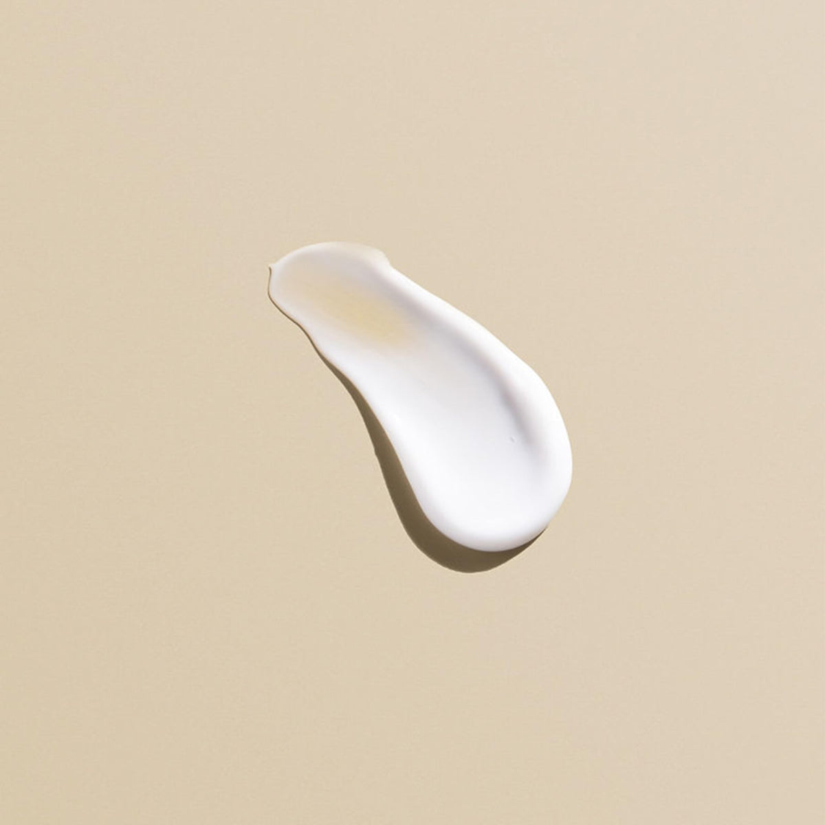 Goldwell bottle on bathroom shelf conveying salon-quality at-home care