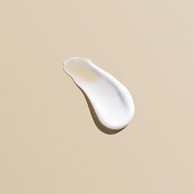 Goldwell bottle on bathroom shelf conveying salon-quality at-home care
