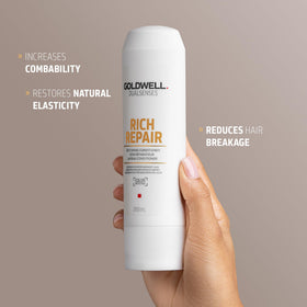Goldwell applying conditioner to hair ends to demonstrate targeted nourishment