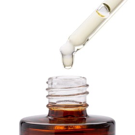 Good Molecules bottle on bathroom shelf with other skincare showing easy routine integration