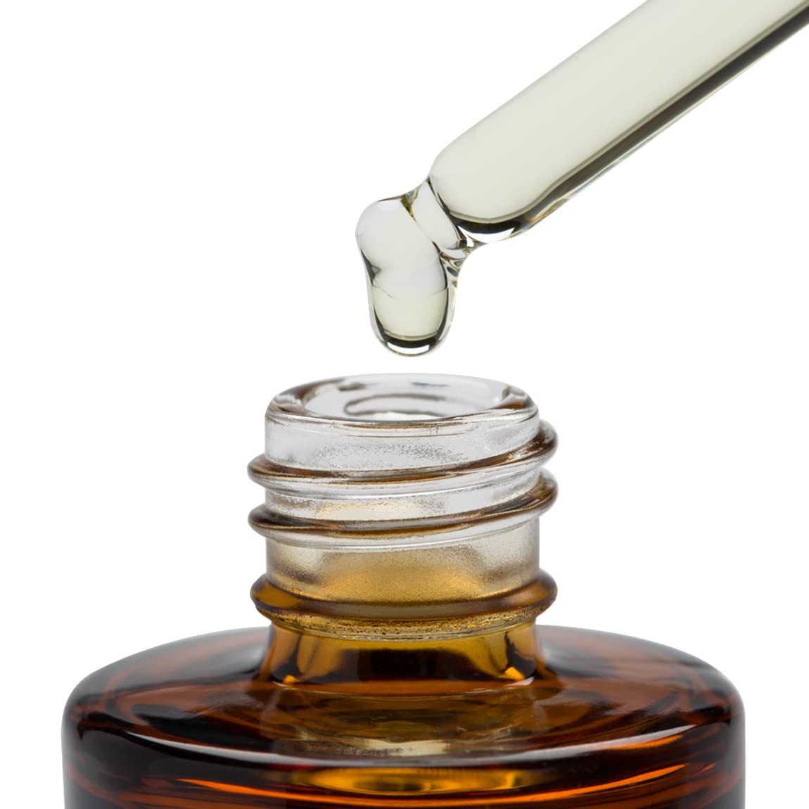 Good Molecules 13 ml bottle beside common objects for scale