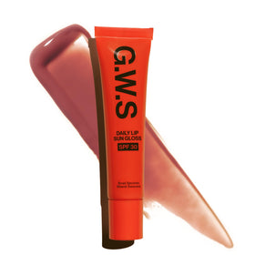 Good Weather Skin front view of ripe berry gloss showing color and tube with protective benefits