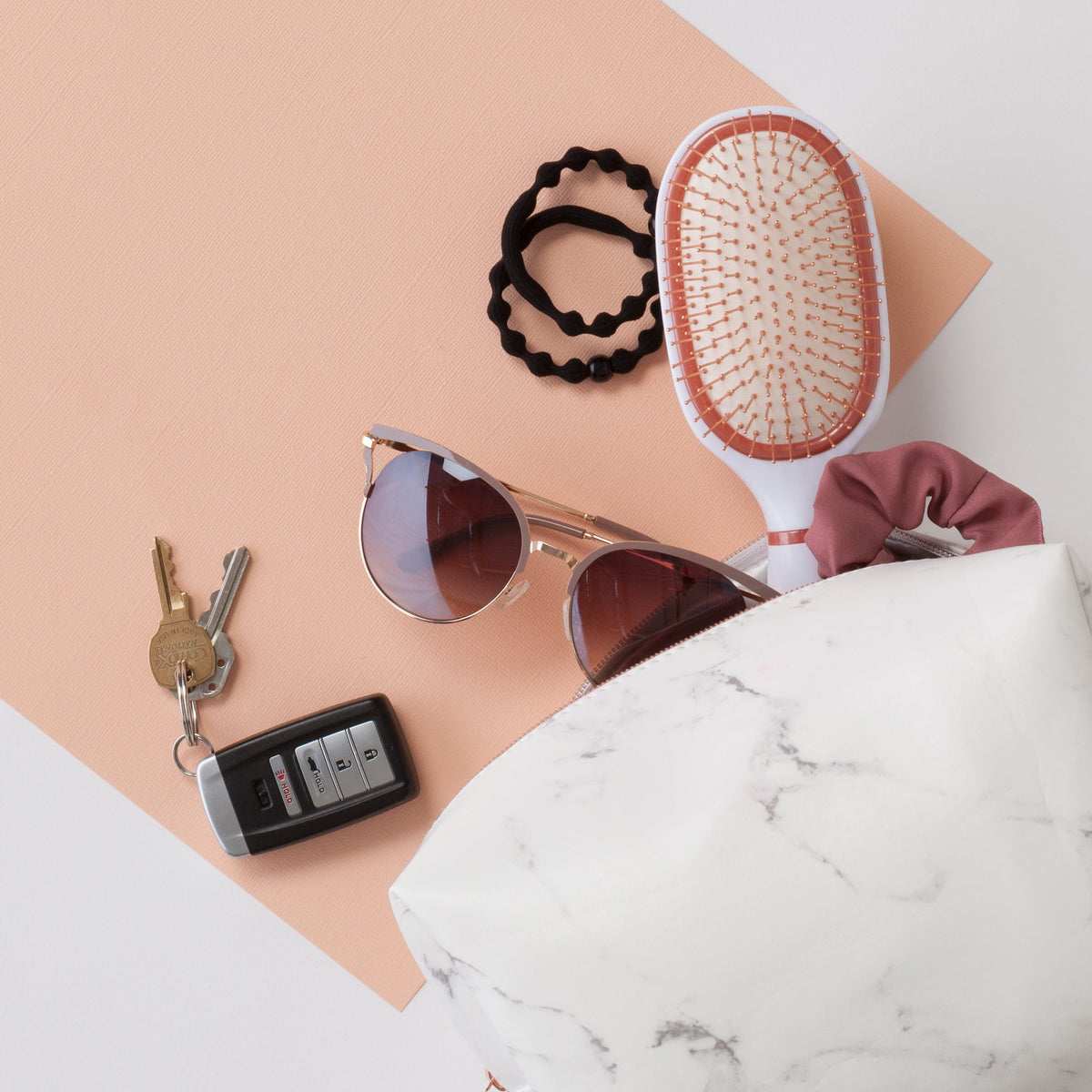 GOODY elastics in multiple colors on a table showing versatile styling options