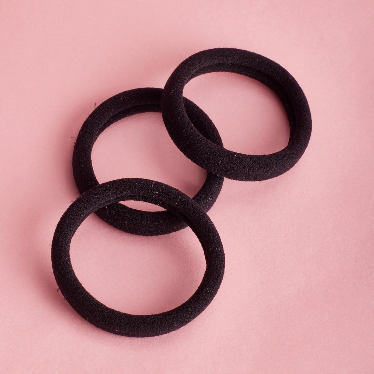 GOODY elastic holding ponytail during workout showing secure, comfortable fit