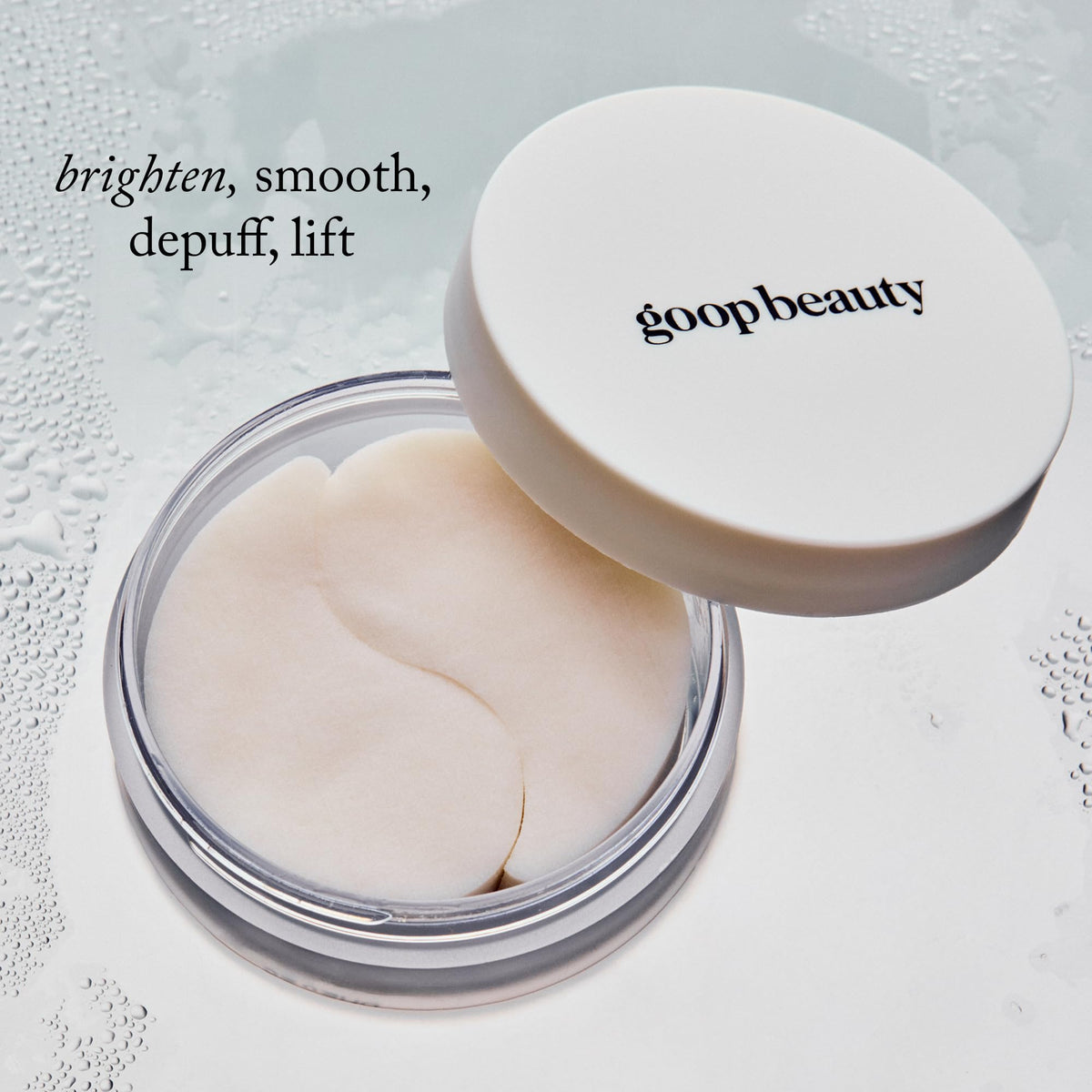 goop product beside hand to illustrate patch size and scale