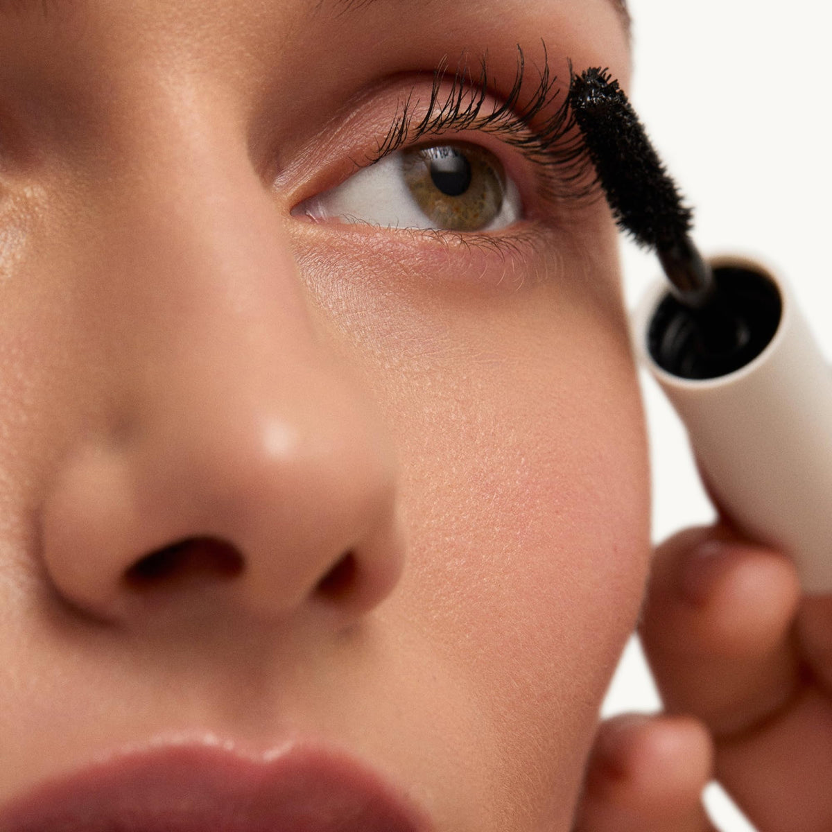 goop Featherlash on bathroom vanity with mirror, suggests everyday wearable finish