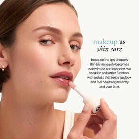 goop Hydra-Barrier Gel Gloss on lips in use providing visible shine and a plumping effect