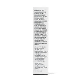 goop lip balm lifestyle outdoors on hand demonstrating protective hydration in cold weather