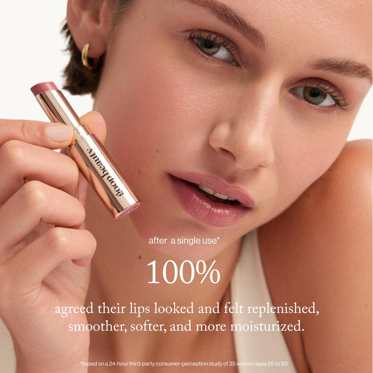 goop tinted lip balm size comparison beside a coin compact and travel-friendly benefit