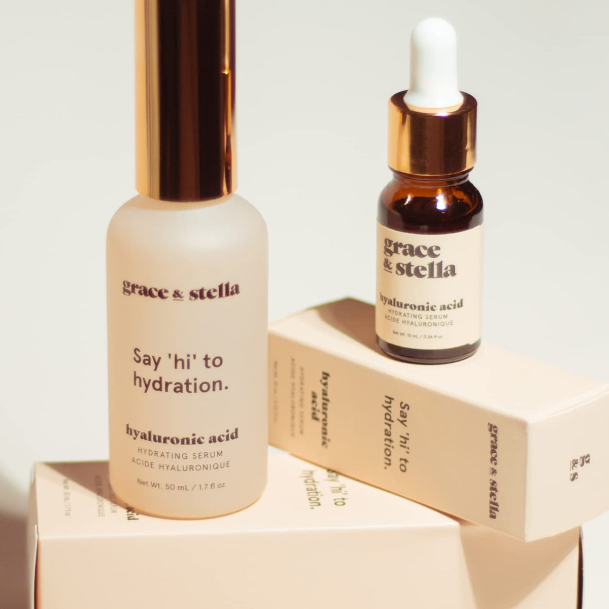 grace & stella serum on bathroom shelf styled with plants for everyday skincare routine appeal