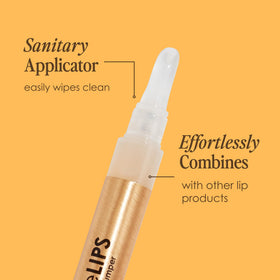 Grande Cosmetics GrandeLIPS held in hand indicating compact travel size