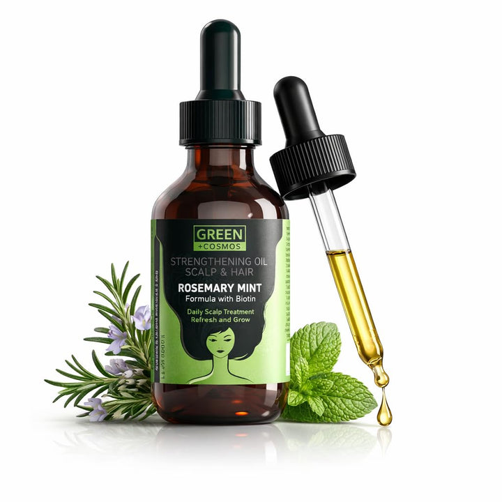 Green Cosmos bottle front view showing label and pure rosemary oil benefits