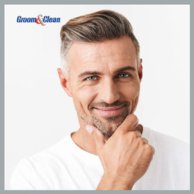 Groom & Clean cream on fingers illustrating easy spread and control