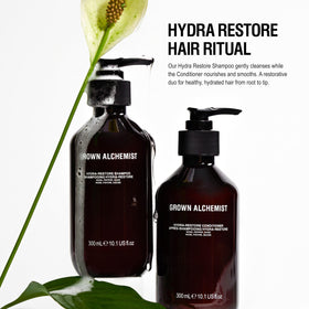 Grown Alchemist conditioner pour demonstrating smooth, detangling consistency