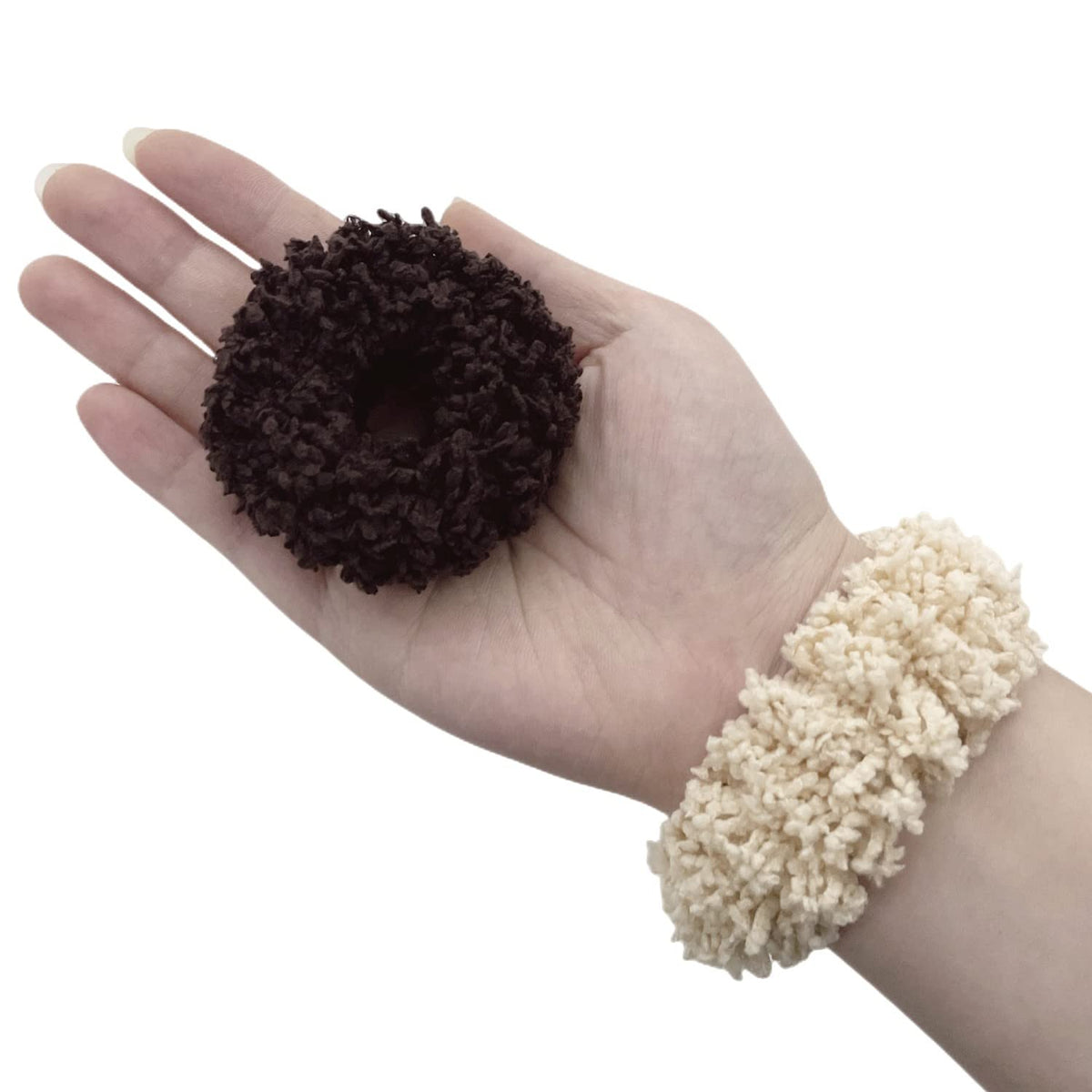 Grutyopkn scrunchie in hand showing size and stretch for thick hair