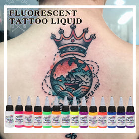GTARTISTOO inks glowing under UV to highlight fluorescent effect at events