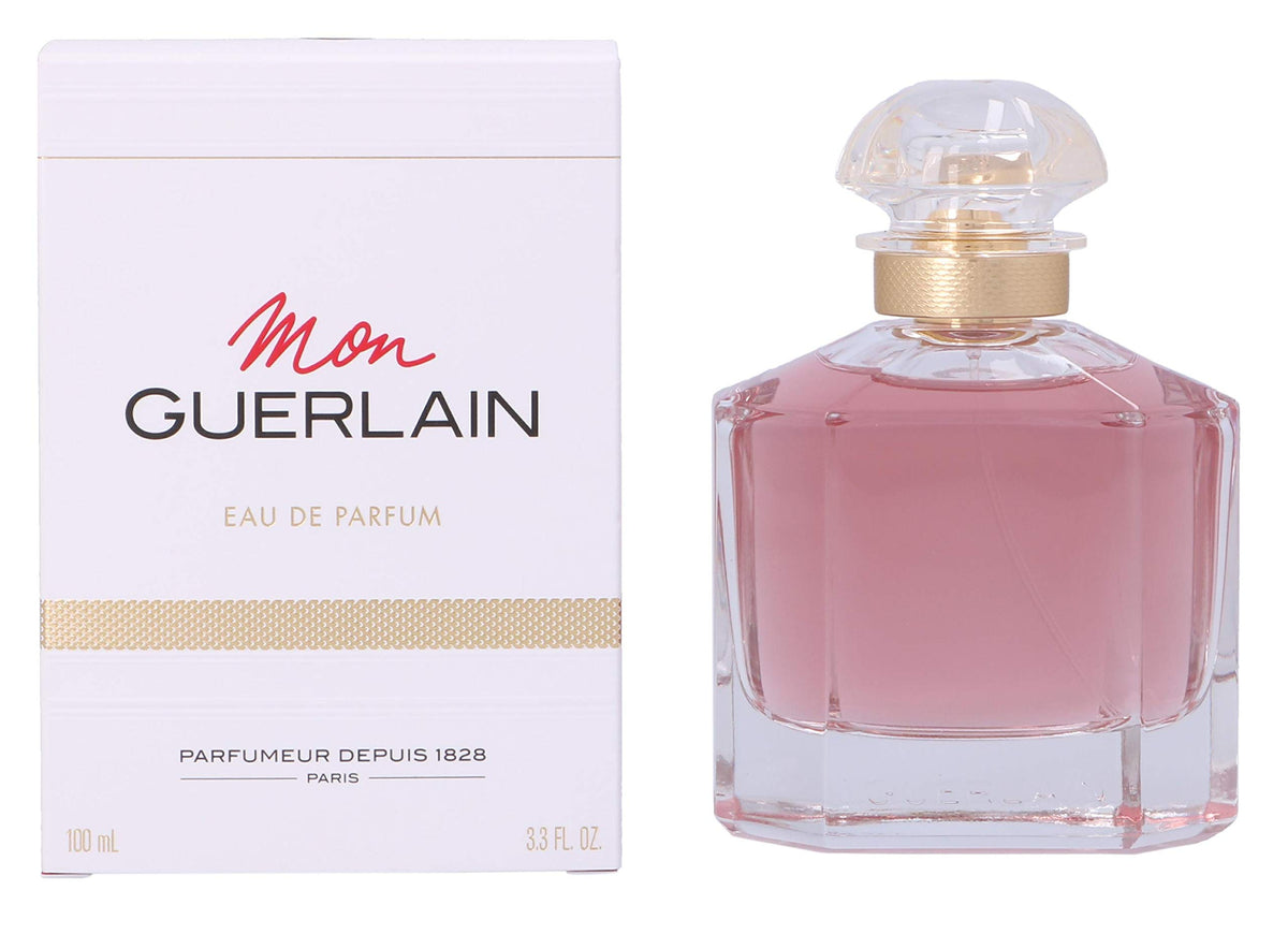 Guerlain Mon Guerlain size comparison with hand showing 3.3 fl oz portability