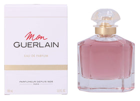 Guerlain Mon Guerlain size comparison with hand showing 3.3 fl oz portability