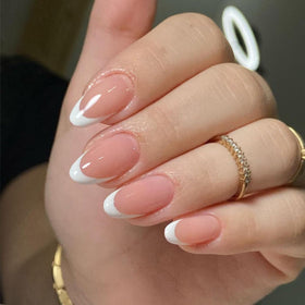 GUFUGU lifestyle shot of woman wearing French-tip nails at event showing stylish result benefit confidence