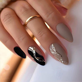GUFUGU nails worn on hand showcasing finished almond manicure look
