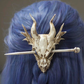GuoShuang dragon skull stick tip close-up showing tapered resin for firm hold