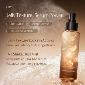 GUYU bottle in hand for scale showing 3.38 fl oz size benefit: travel-friendly