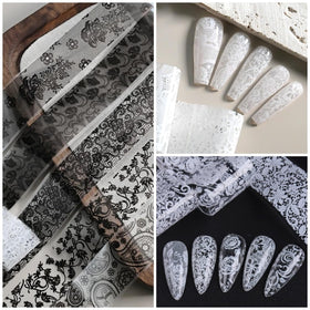 GZMAYUEN finished nails with black and white flower foils demonstrating salon finish