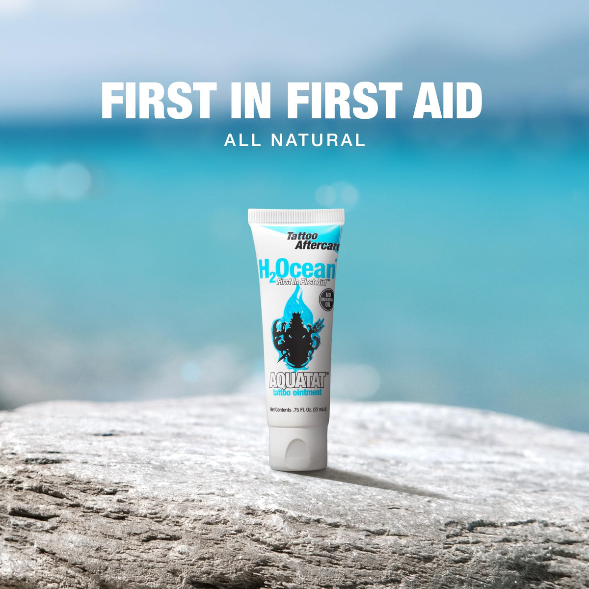 H2Ocean Aquatat beside a coin for scale displaying the small 0.75 oz travel-friendly tube