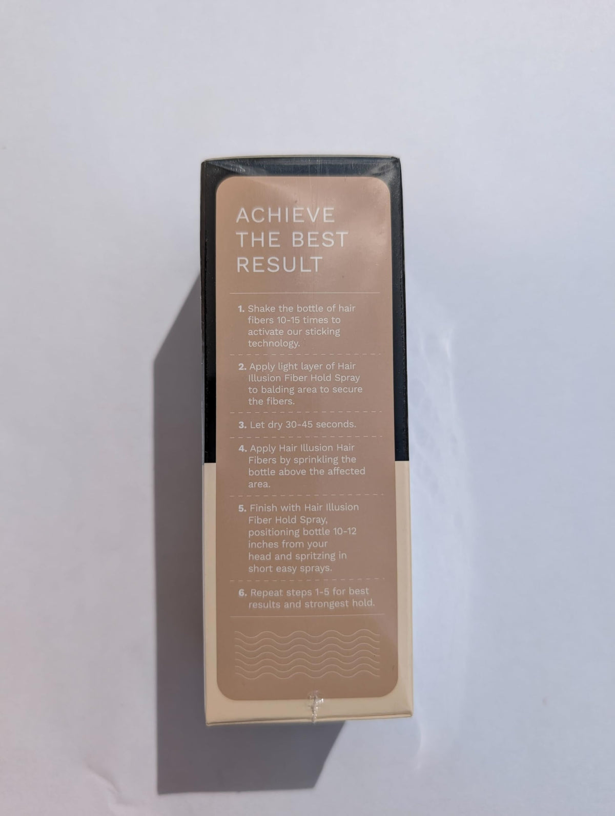 Hair Illusion fibers with Fiber Hold On Spray to secure coverage during activity
