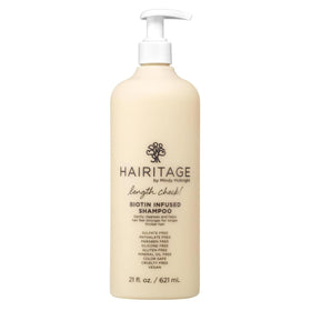 Hairitage front label showing product name and 21 oz size for clear identification and benefits
