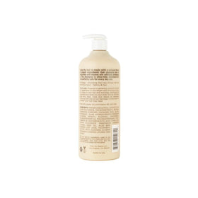 Hairitage label close-up highlighting jojoba and aloe ingredients