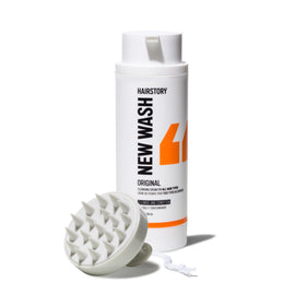 Hairstory New Wash front bottle showing product and label, promotes gentle cleansing