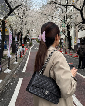 Hana Mia wearing clip in half-up style demonstrating secure hold without pulling