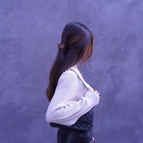 Hana Mia clip securing a messy bun comfortably without pulling