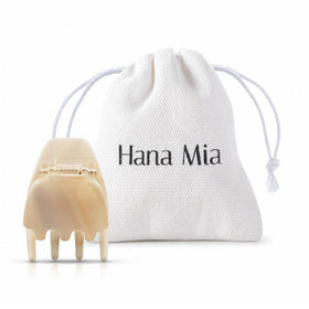 Hana Mia creme claw clip front view showing glossy finish and compact benefit