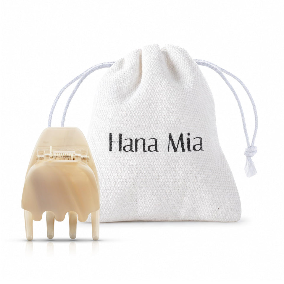 Hana Mia creme claw clip front view showing glossy finish and compact benefit
