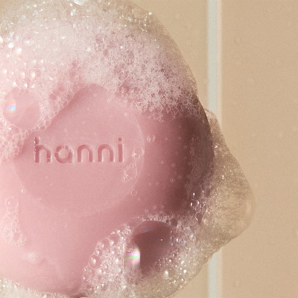 HANNI creamy serum texture on hand highlighting moisturizing cushion