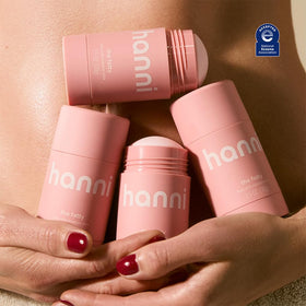 HANNI fatty stick open with visible balm tip demonstrating smooth glide benefit