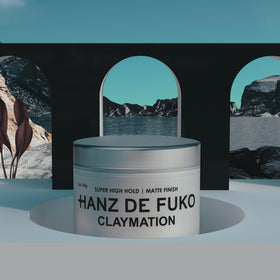 Hanz de Fuko Claymation 2 oz jar beside a common object for size and portability