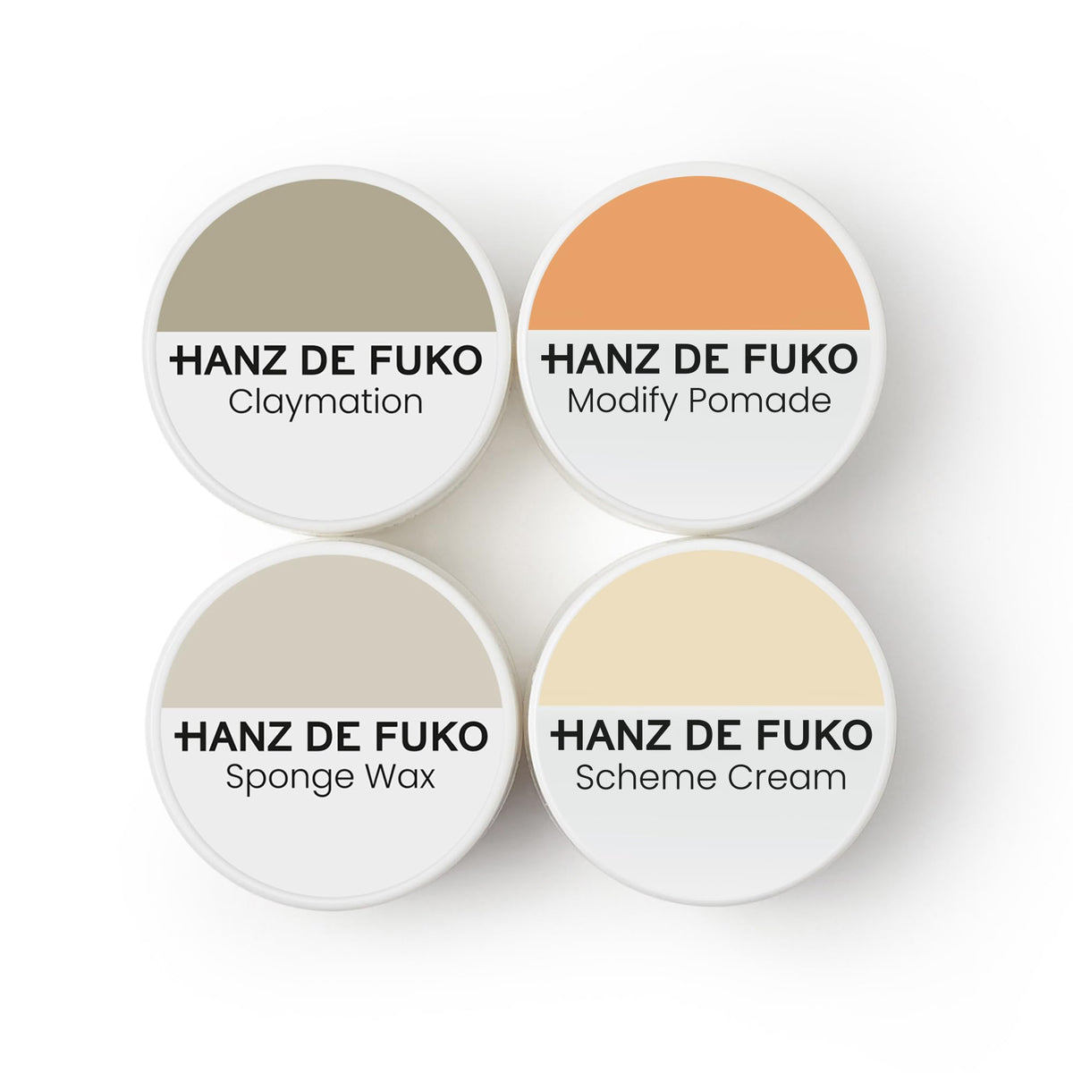 Hanz de Fuko four-piece sampler pack showing compact travel jars and variety