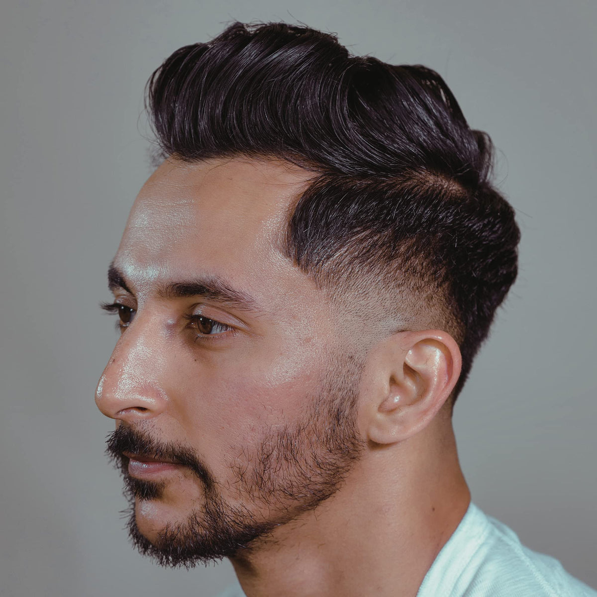 Hanz de Fuko styled side profile model showing natural medium shine and hold benefit