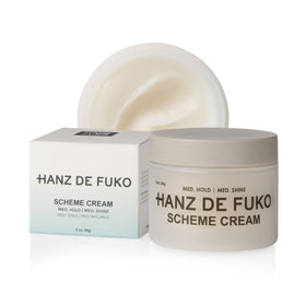 Hanz de Fuko front packaging showing compact 2 oz travel jar and branding benefit portable styling