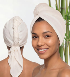 Harmony Weave front view of ivory towel wrap showing compact turban and brand label, fast drying benefit