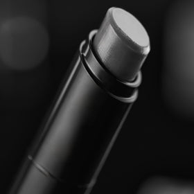 Harry's application on male lips demonstrating clear finish and natural-looking hydration benefit