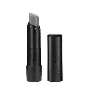 Harry's tube front view showing sleek matte black design and portability