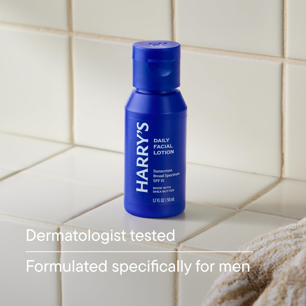 Harry's face lotion open cap dispensing a pump showing no-grease finish benefit