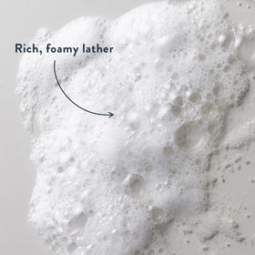 Harry's creamy lather texture on washcloth showing thick foam and gentle cleanse